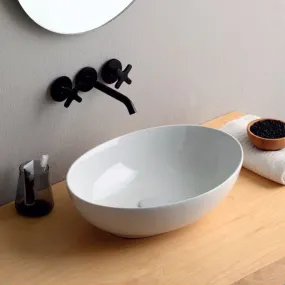 Lavabo à poser design MINI SHELL en céramique blanche brillante