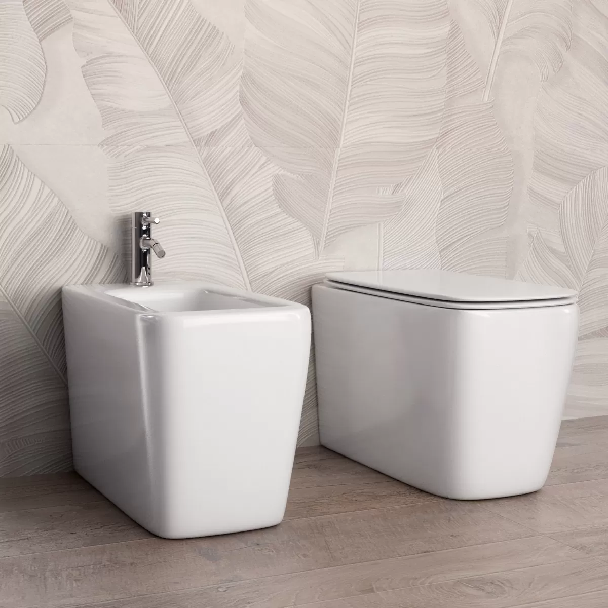 Sanitari a Terra Filo Muro in ceramica bianca con copri vaso frizionato Qubo