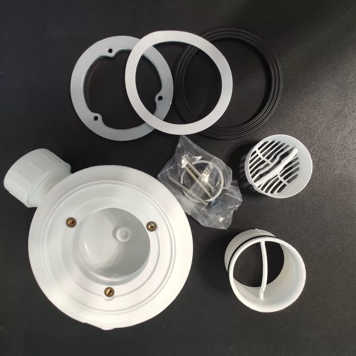 Siphon et bonde de vidange pour receveurs de douche